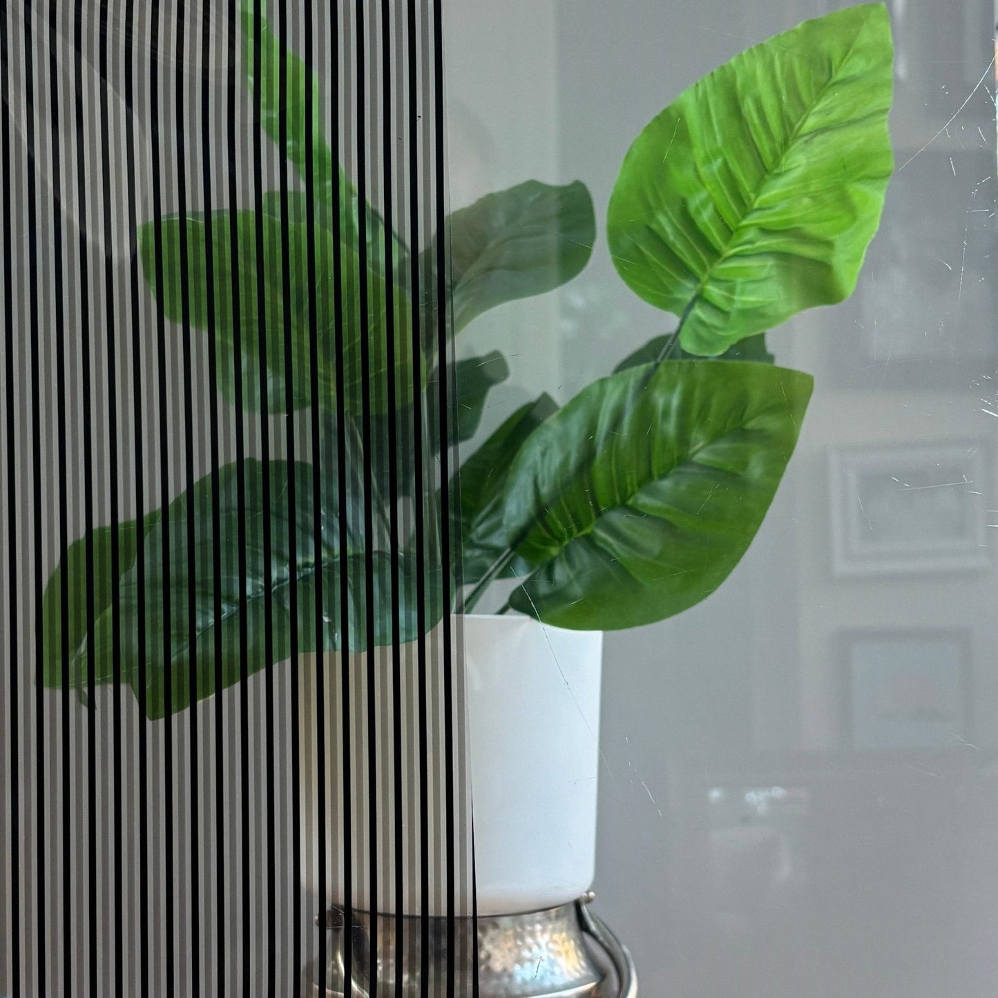 SM211K - Striped - 1.5mm wide black and frost stripes on a clear window film - Clearview Graphics