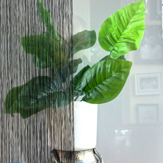 SM508K - Striped - Thin black stripes on a clear window film - Clearview Graphics